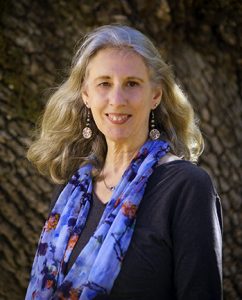 A photo of D. Leah Steinberg smiling at the camera.